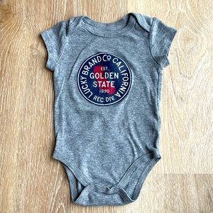 Lucky Brand baby onesie 6-9 month